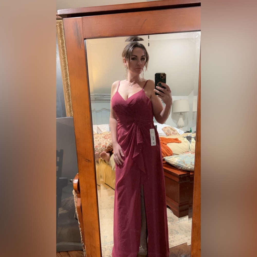 Beautiful berry colored dress. Size 4. Classy, feminine yet sexy. True to size.